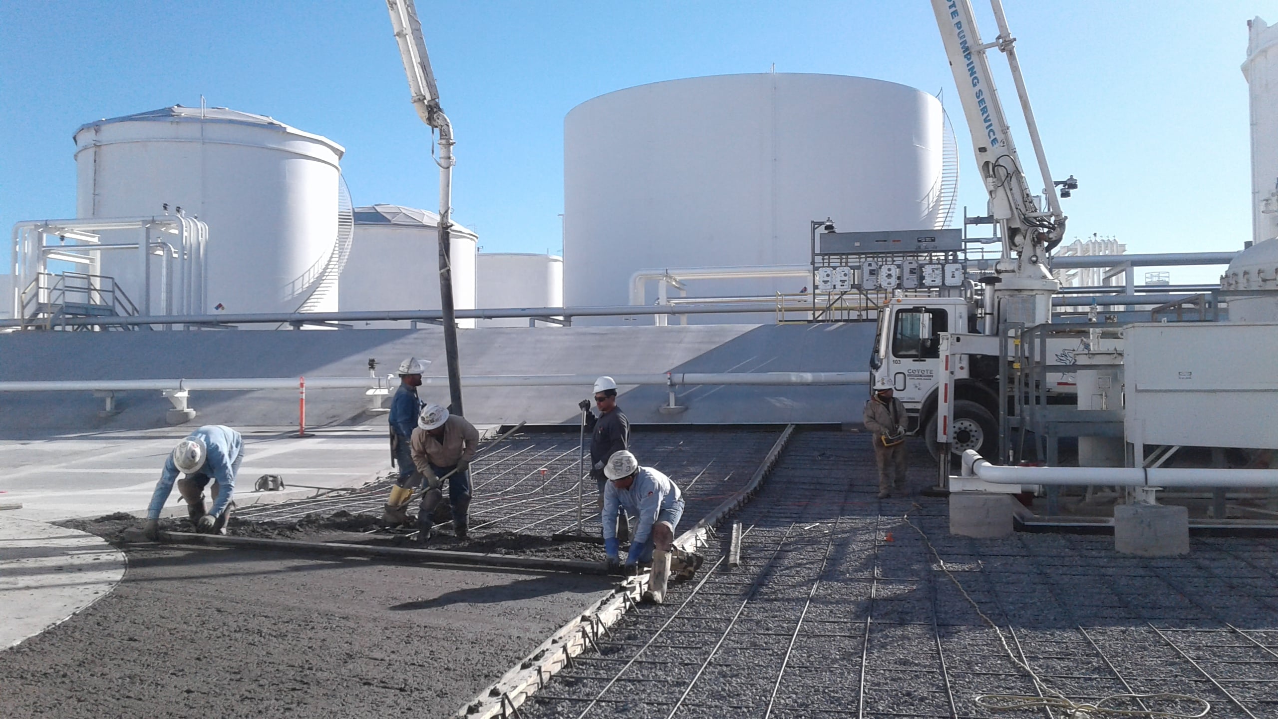 Bodell Workers Smoothing Wet Cement